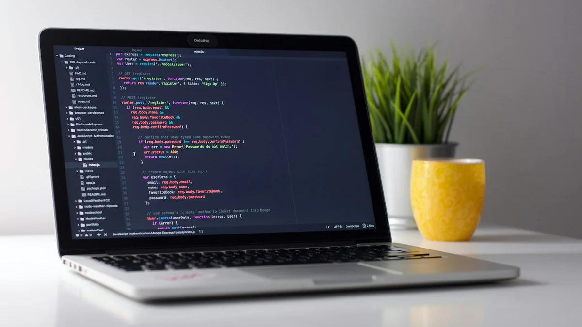 Modern developer laptop running crisp code editor on Linux Wayland